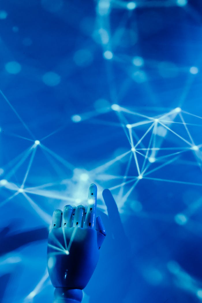 Robot's Hand on a Blue Background